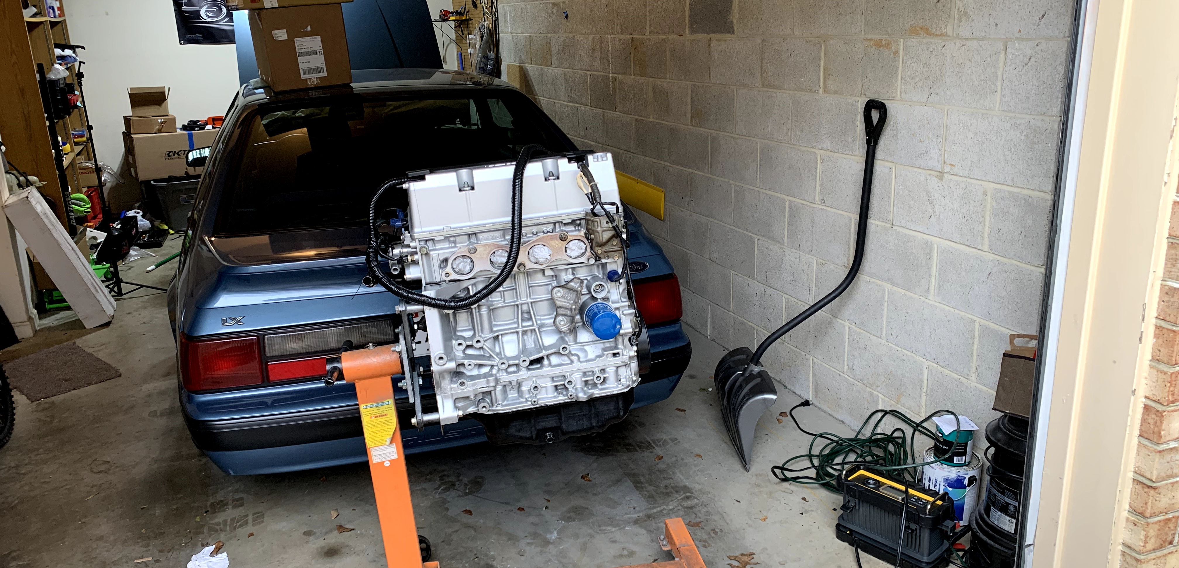 K-Swap in garage with Mustang